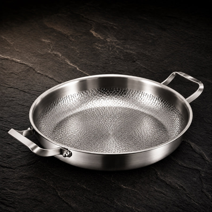 Pure Safe Titanium Two-Handled Sauté Pan on a dark slate background