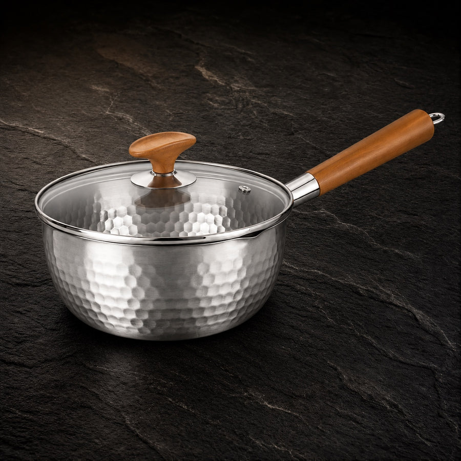 Pure Safe Titanium Pot Pan on a dark slate background
