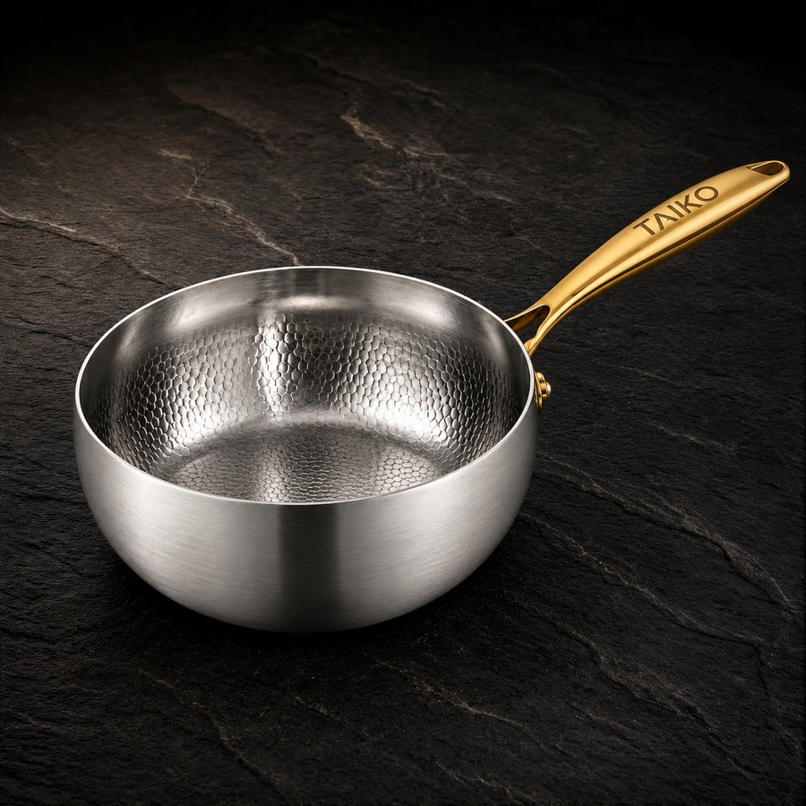 Pure Safe Titanium SafeCook Pot Pan Pro on a dark slate background