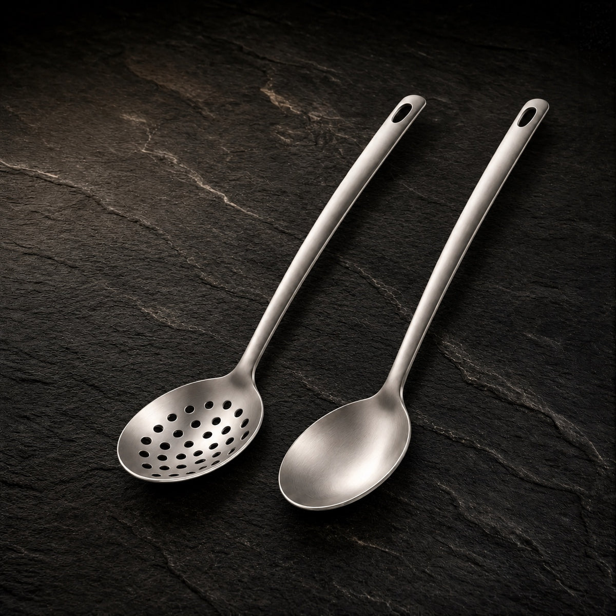 Titanium Durable Soup Spoons Set on a dark slate background
