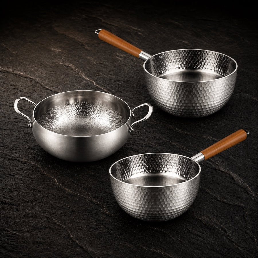 Titanium Exclusive Pot Set on a dark slate background