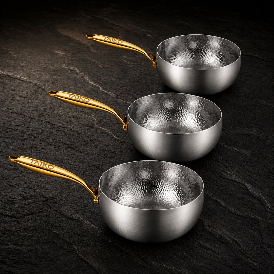 Titanium Pro Pot & Pan Bundle on a dark slate background