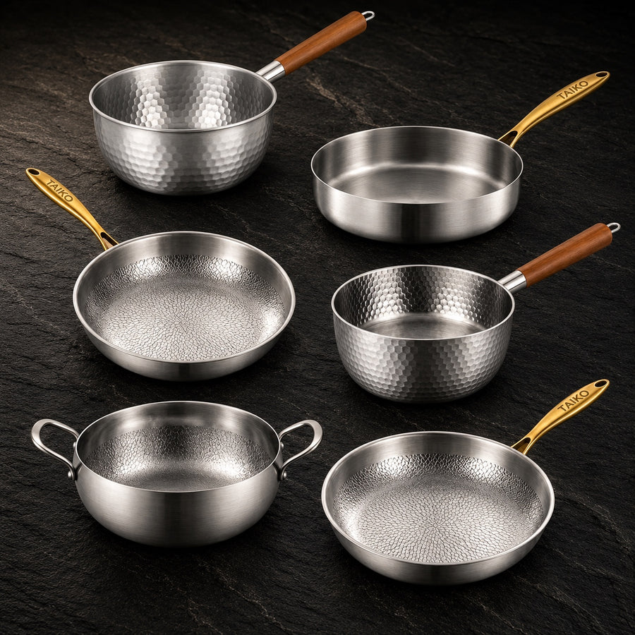 Titanium Ultimate Pot & Pan Set on a dark slate background