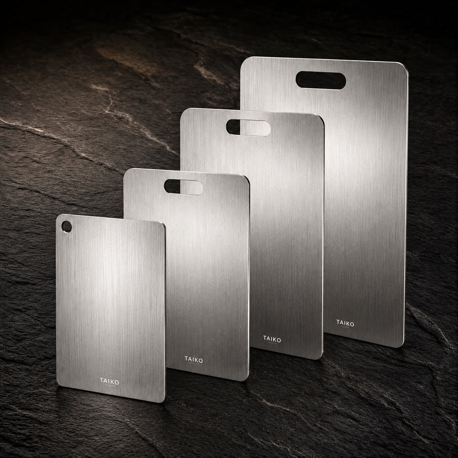 Titanium Cutting Board Set on a dark slate background
