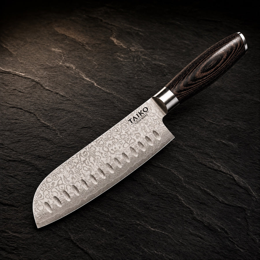 SakuraEdge Japanese Santoku Knife -7.1 inch (18 cm) on a dark slate background